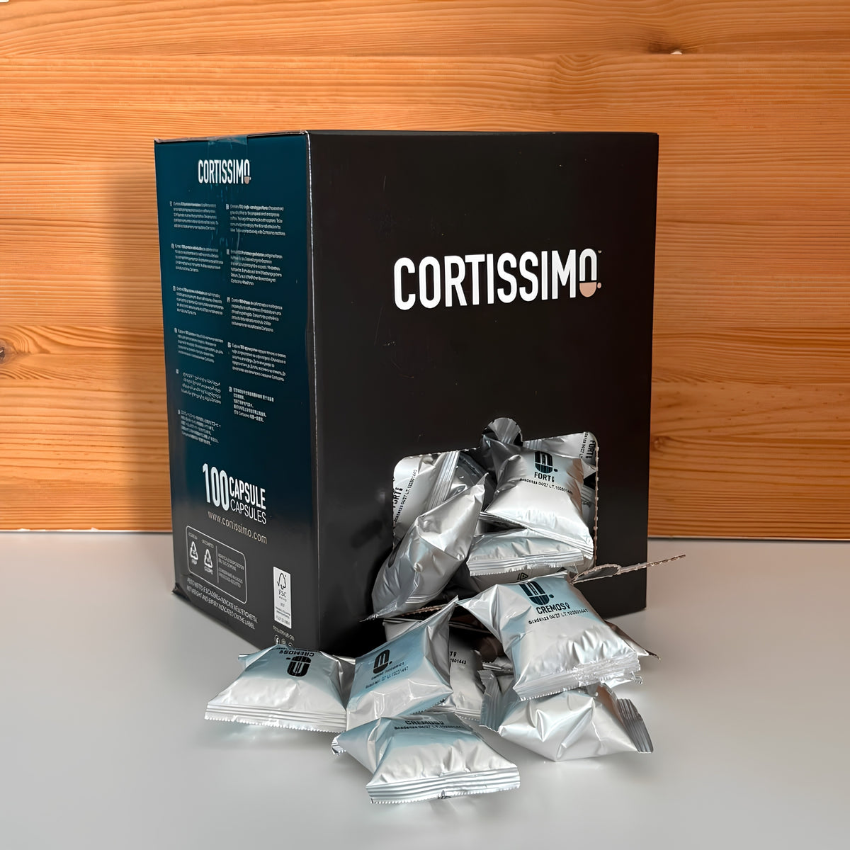 Scatola_100_capsule_aperta_con_capsule